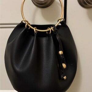Chic Black Leather Shoulder Bag with Gold Ring Handle